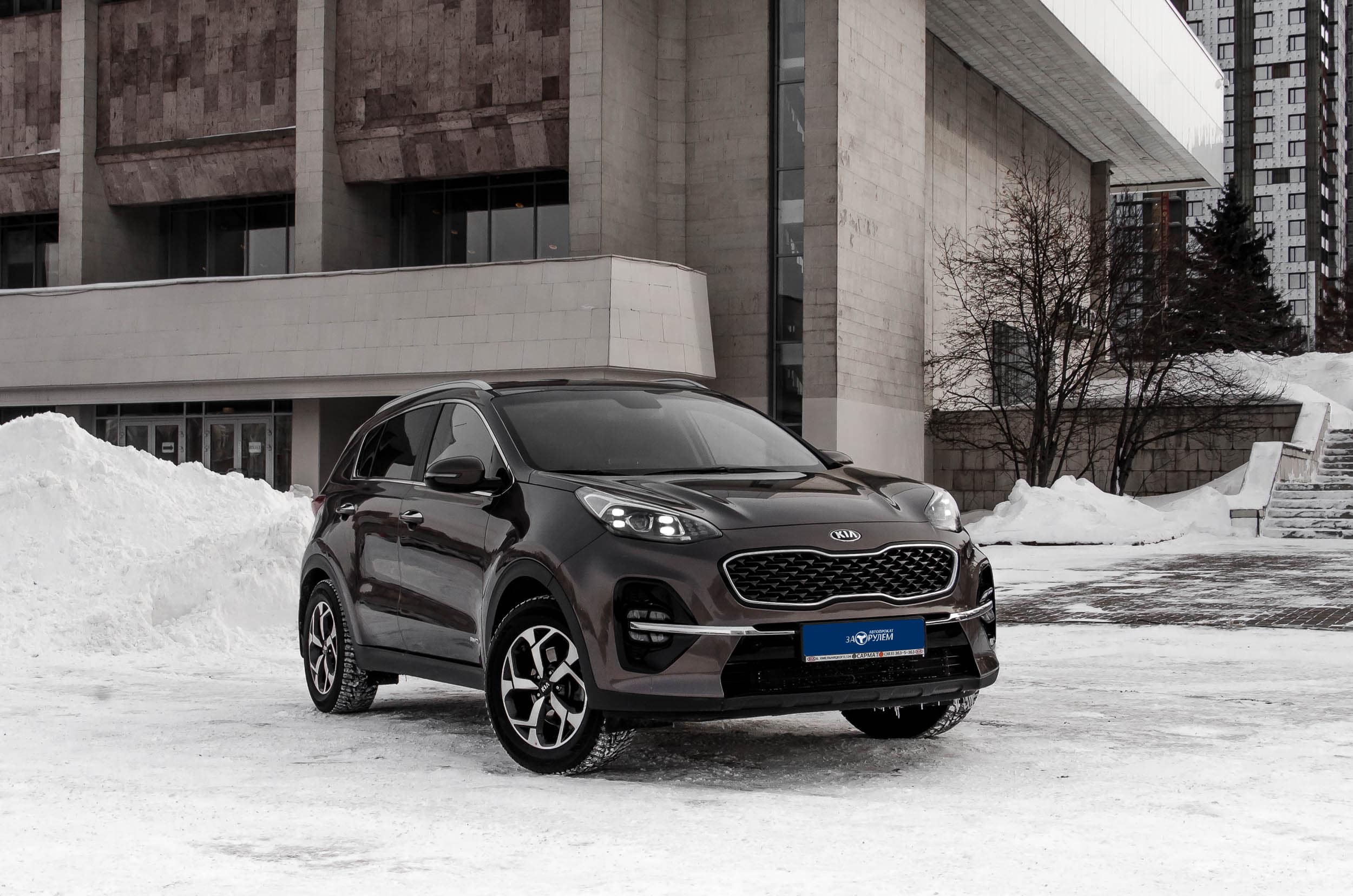 Аренда Kia Sportage Серо-коричневый в Новосибирске без водителя